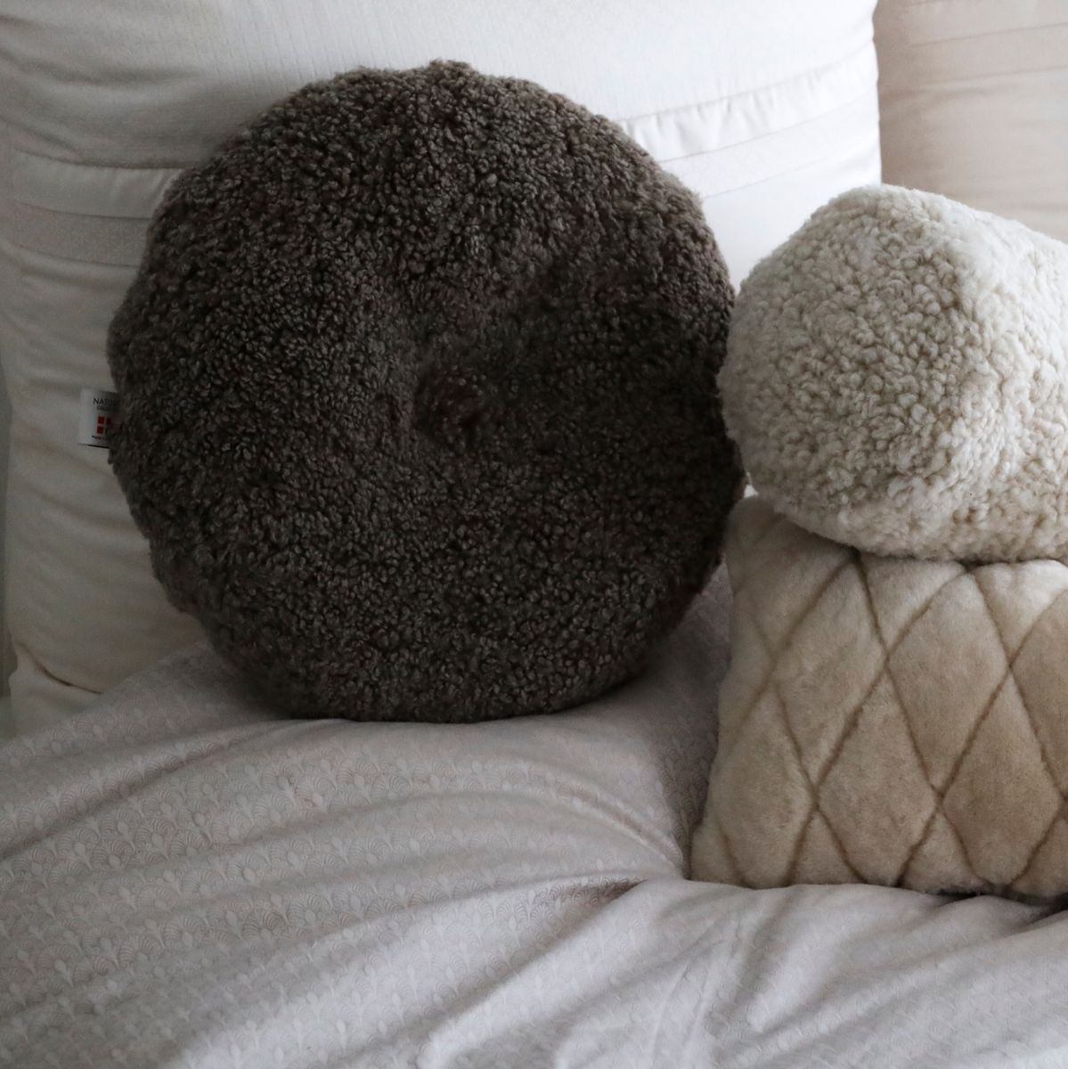 Almofada de pele de cordeiro | Pêlo curto | Nova Zelândia | Dupla Face | D40cm